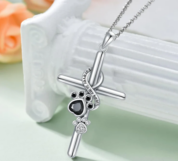 SILVER PAW CROSS NECKLACE