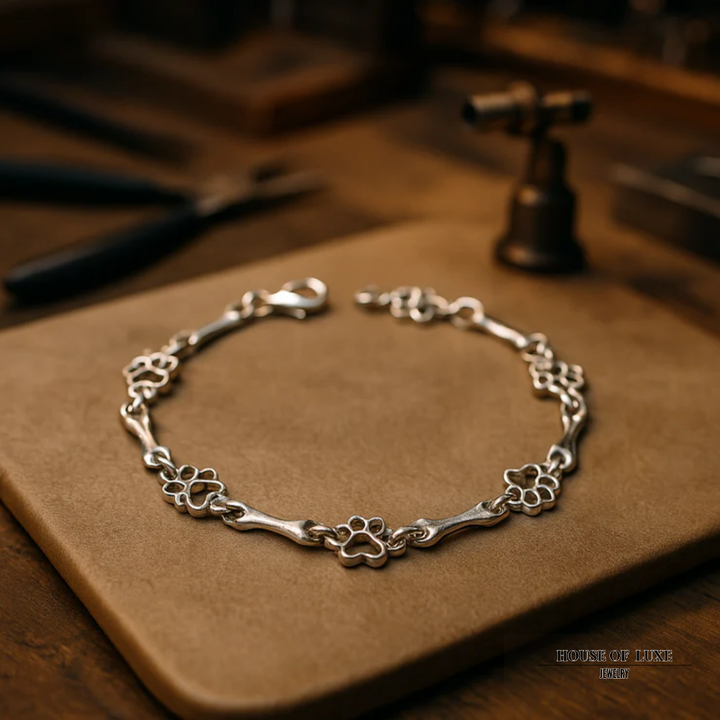 SILVER DOG PAW AND BONE CHARMS BRACELET