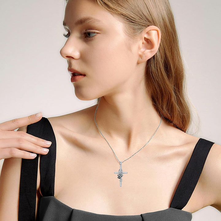 SILVER PAW CROSS NECKLACE