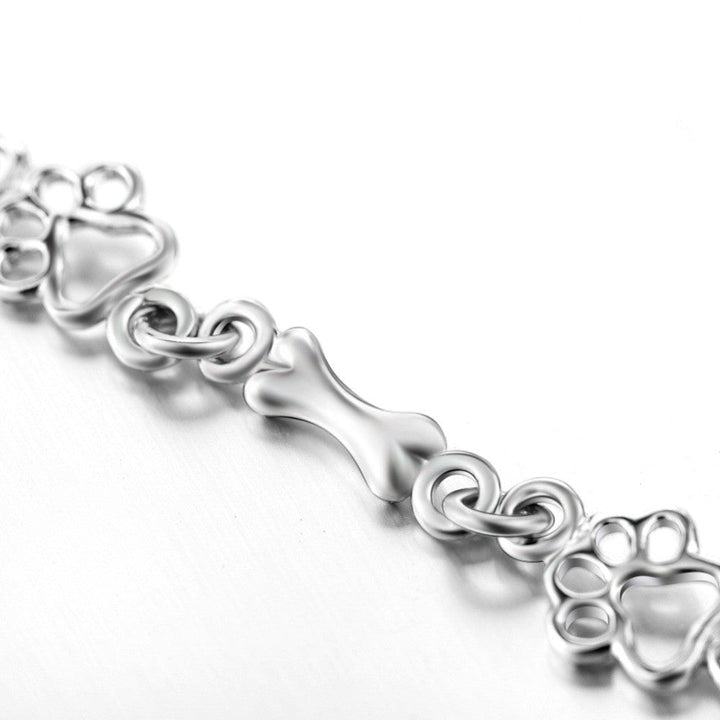 SILVER DOG PAW AND BONE CHARMS BRACELET