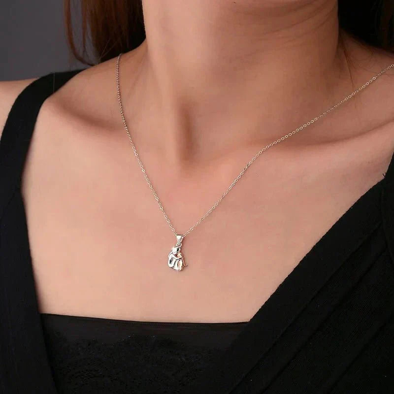 DOG HUG PENDANT NECKLACE